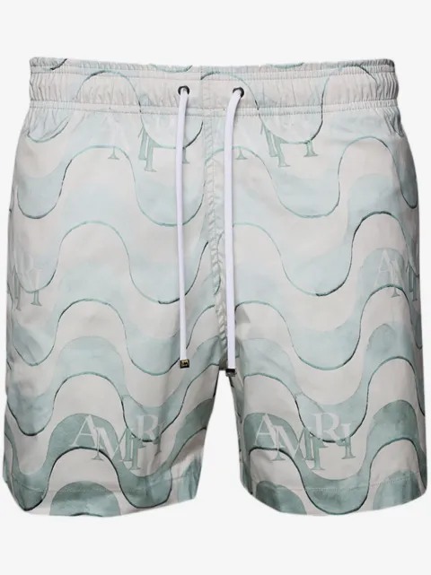 AMIRI shorts de playa con estampado gráfico