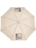 Moschino logo-barcode-print compact umbrella - Neutrals