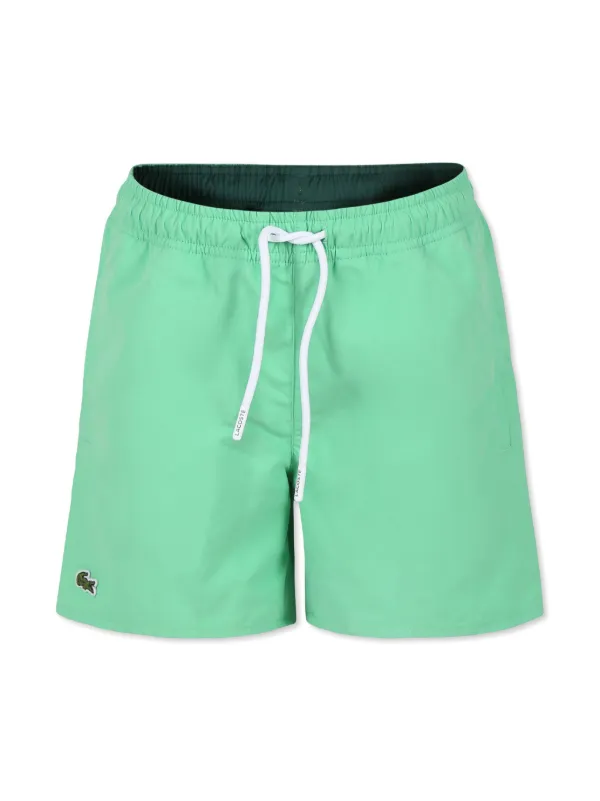 Green lacoste swim shorts on sale