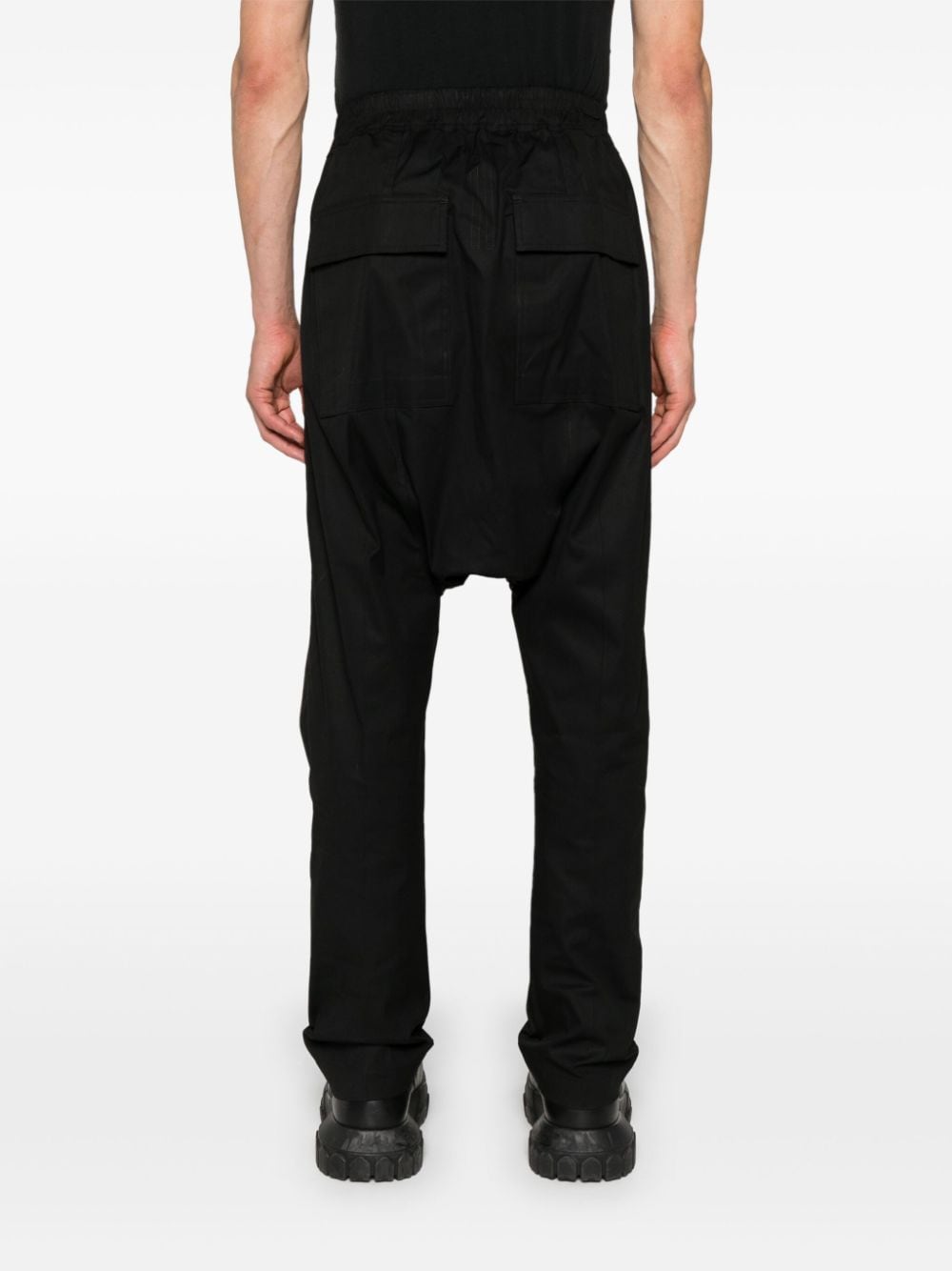 Shop Rick Owens Drop-crotch Tapered Trousers In Black