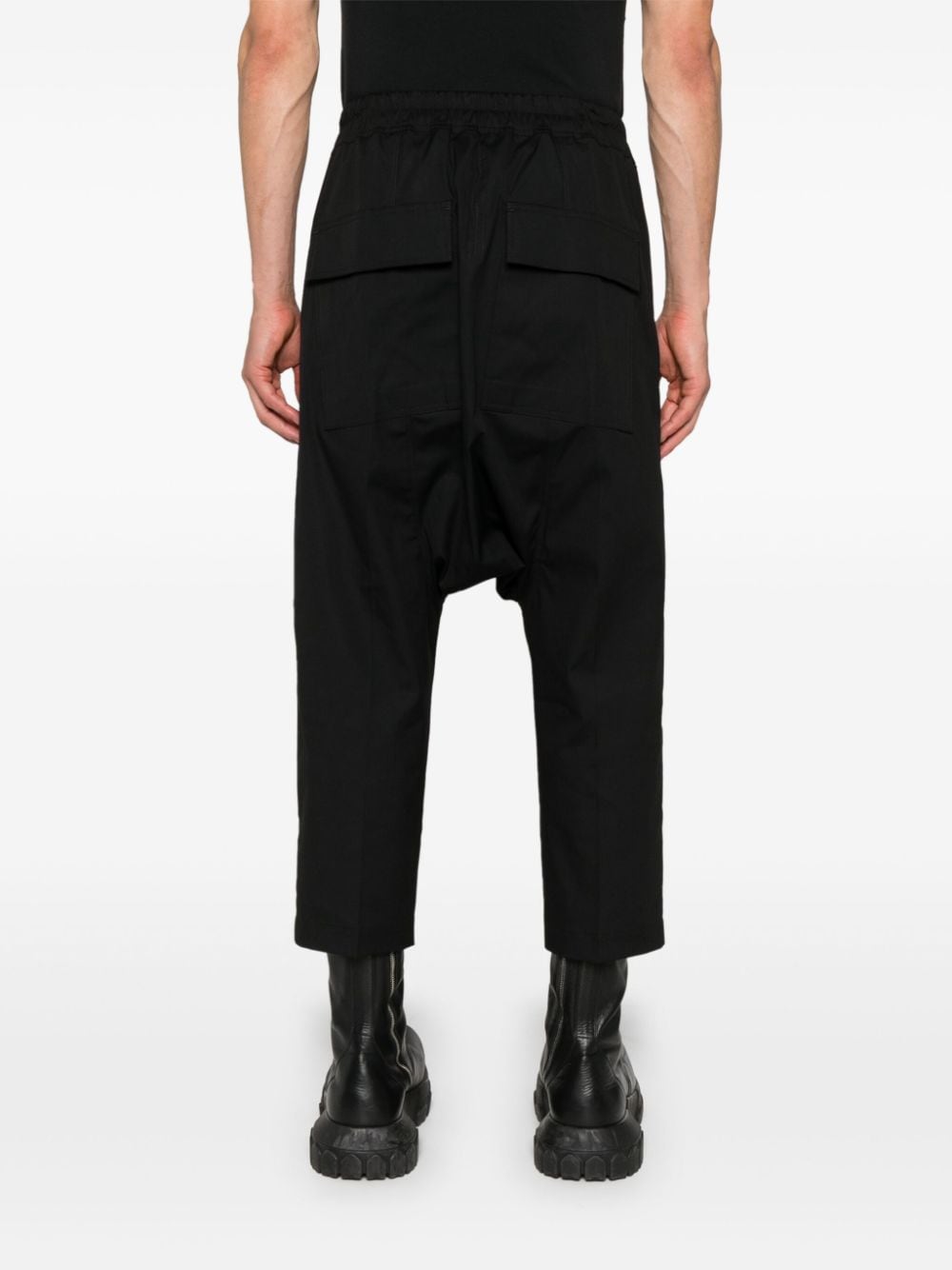 Shop Rick Owens Drop-crotch Tapered Trousers In Black