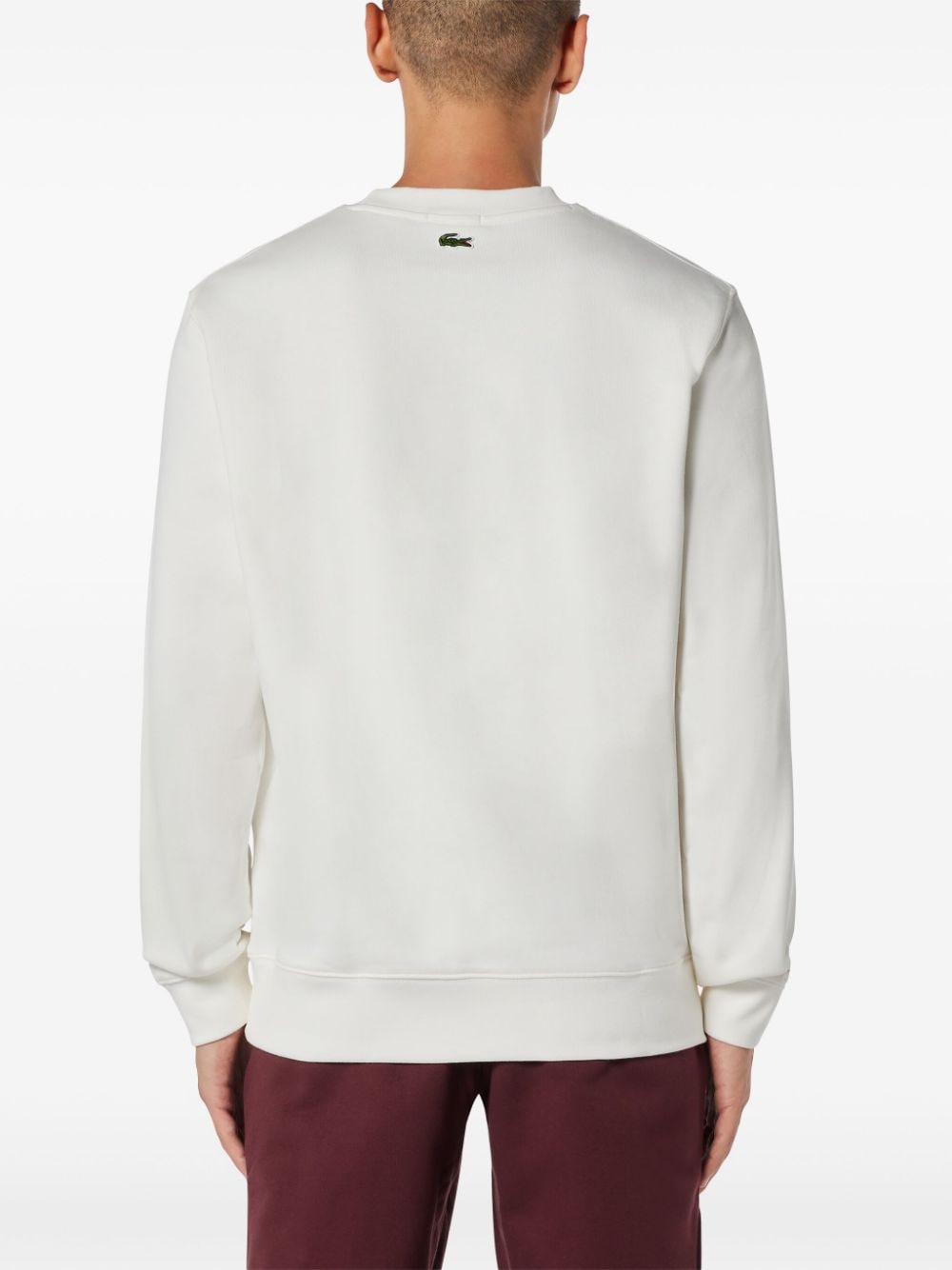 Shop Lacoste Embroidered Logo Sweater In White