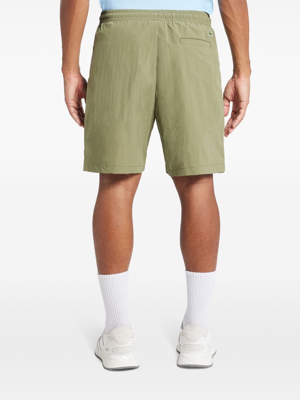 Shop Lacoste Zip-pocket Bermuda Shorts In Green