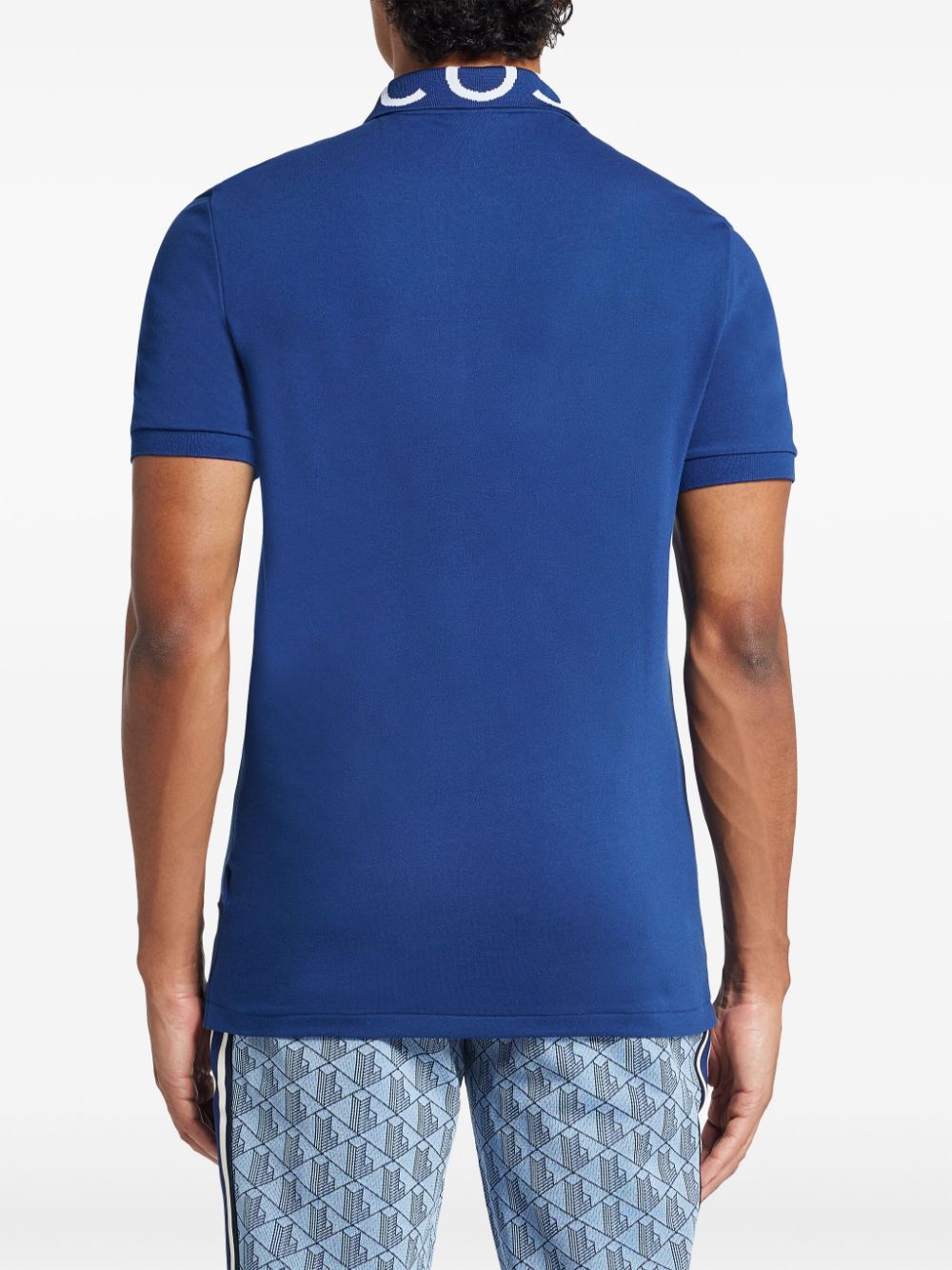 Shop Lacoste Movement Polo Shirt In Blue