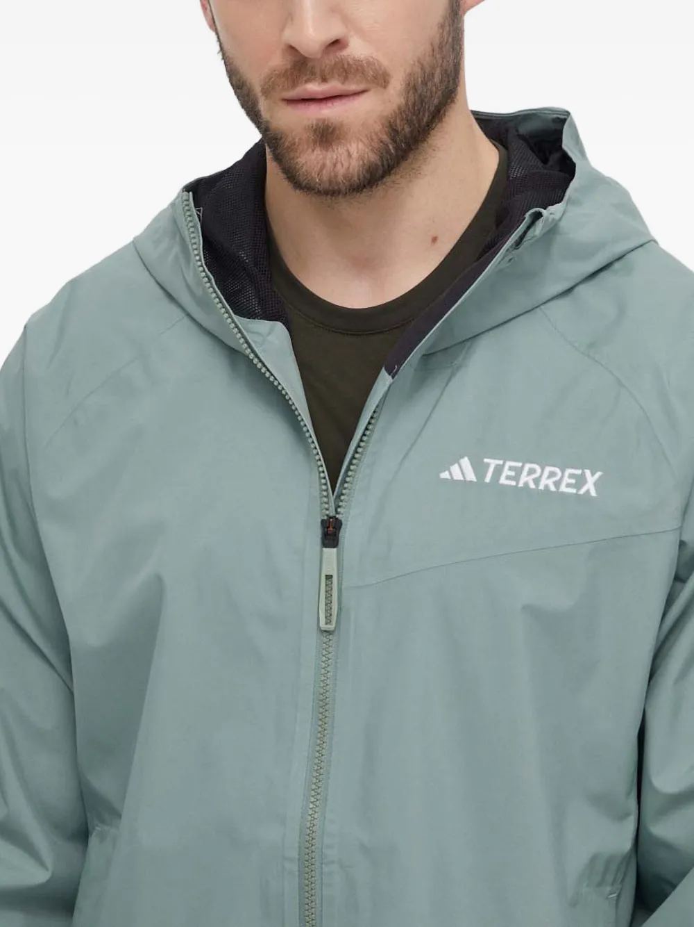 adidas Regenjack met capuchon Groen