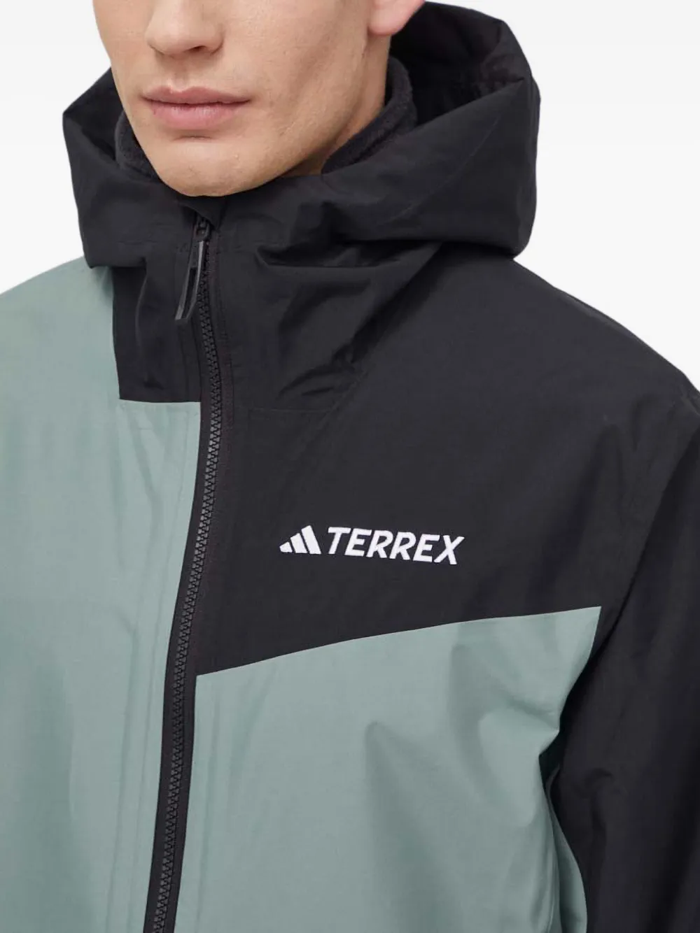 adidas Jack met capuchon en colourblocking Groen