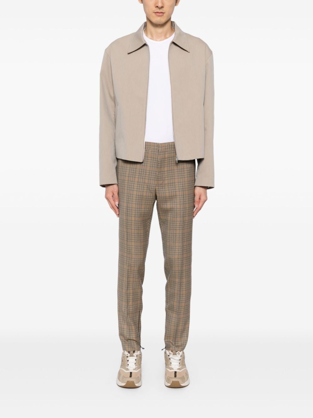 Shop Lanvin Checked Tapered Trousers In Braun