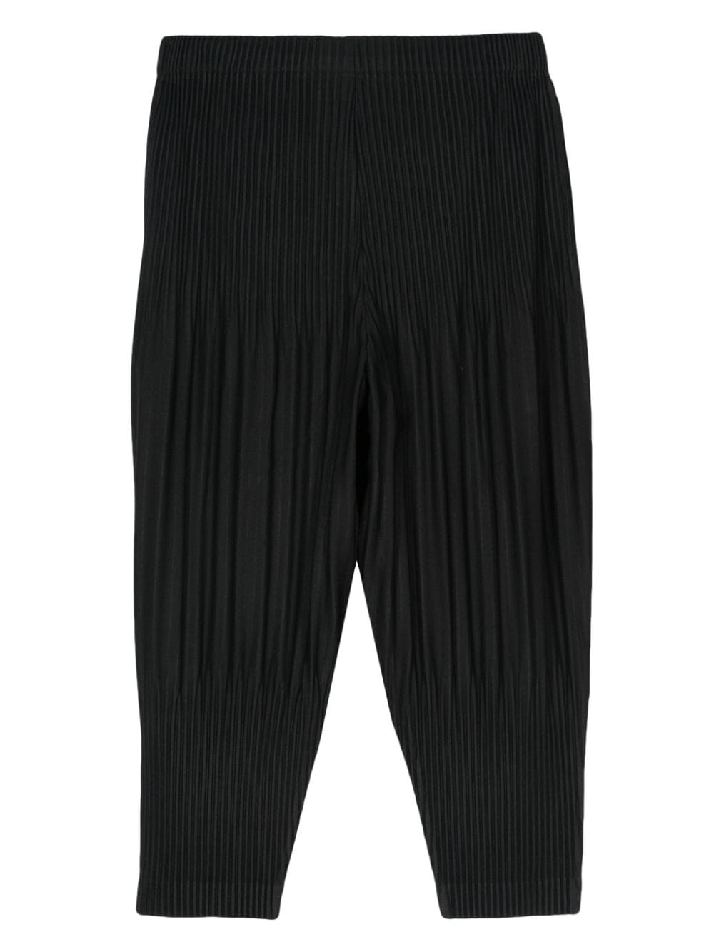 Shop Issey Miyake Plissé Tapered Trousers In Black