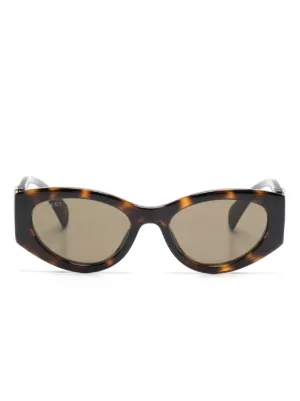 Gucci Eyewear Tortoiseshell cat-eye Sunglasses | Brown | FARFETCH