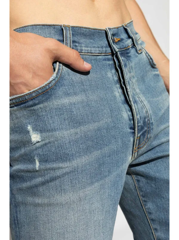 AMIRI Stack low-rise Skinny Jeans | Blue | FARFETCH