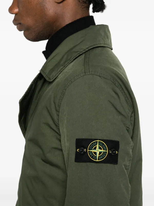 Coat with compass logo best sale