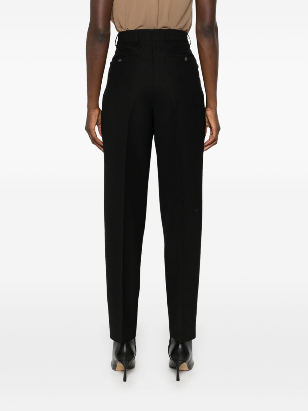 Shop Totême Low-rise Tailored Trousers In Black