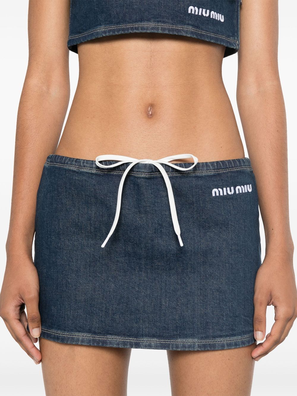 Miu Miu logo-embroidered denim mini skirt Women