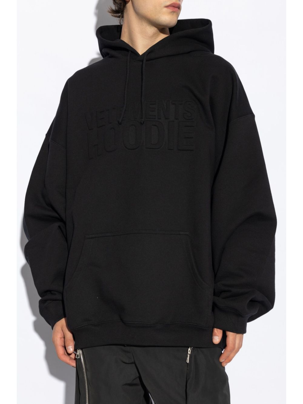 Shop Vetements Logo-embossed Hoodie In Black