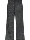 Moschino monogram-jacquard trousers - Black