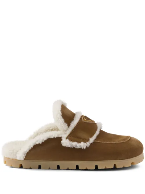 Mules à bords en peau lainée - Prada - Modalova