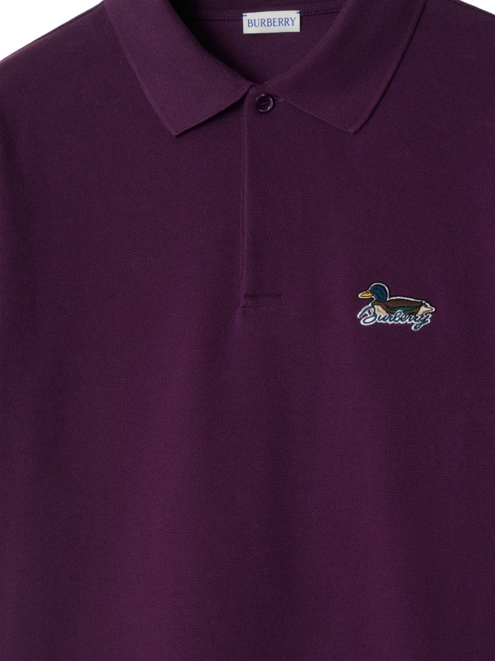 Shop Burberry Logo-appliqué Cotton Polo T-shirt In Purple