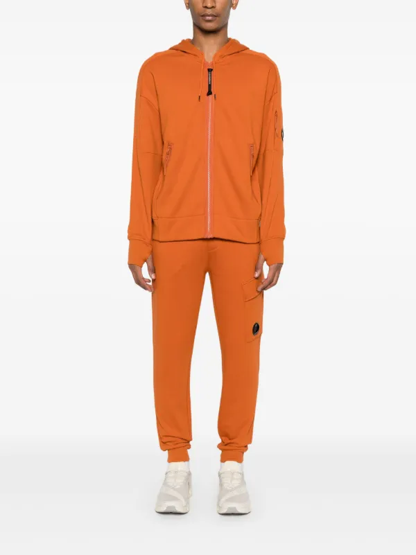 C.P. Company フリース トラックパンツ | オレンジ | FARFETCH JP