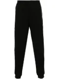 Ea7 Emporio Armani rubberised logo track pants - Black