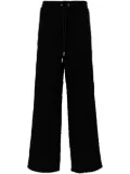 Off-White logo print wide leg trousers - Black