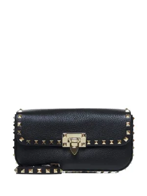 Valentino Garavani スタッズ クラッチバッグ | ブラック | FARFETCH JP