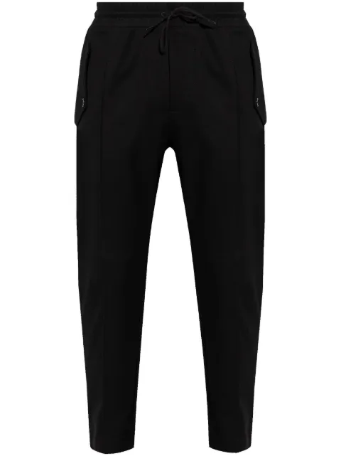 Moschino Logo-patch trousers