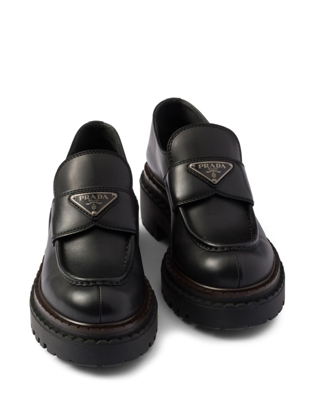 Shop Prada Leather Loafers In Schwarz