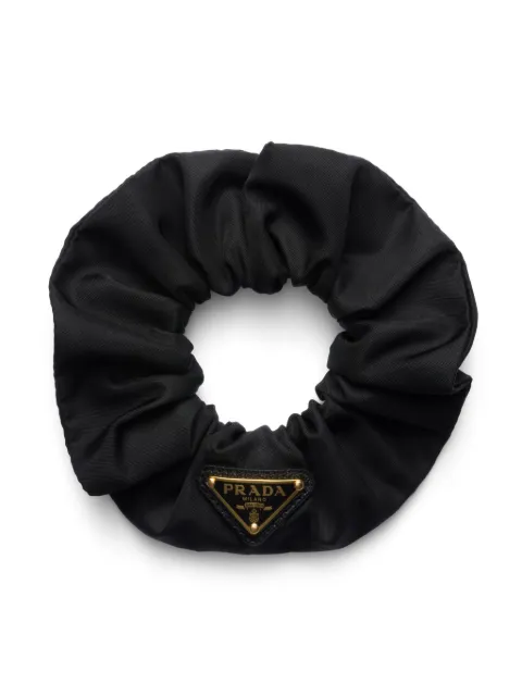 Prada dona Re-Nylon con logo triangular
