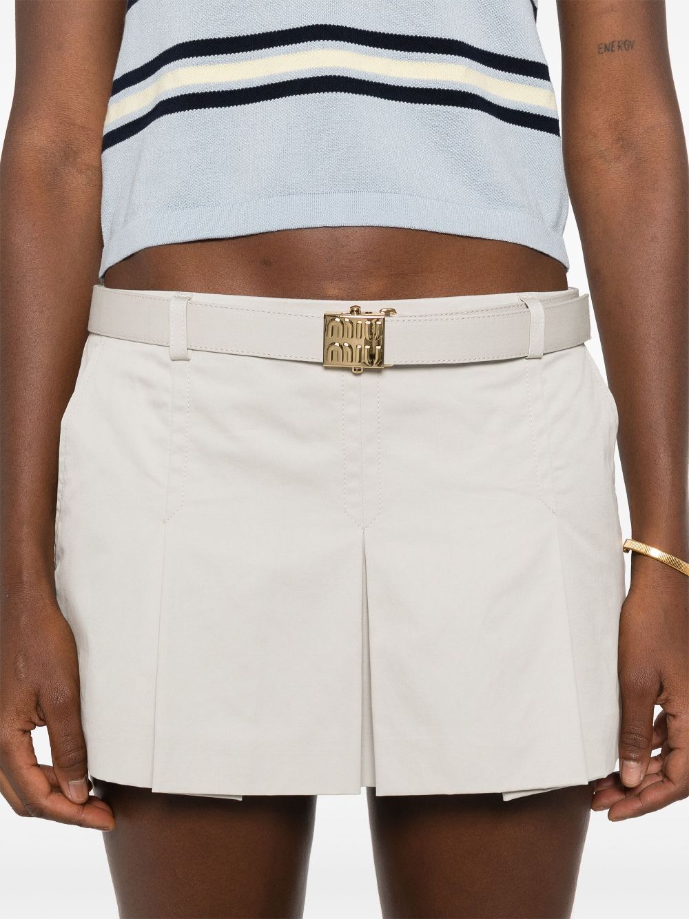 Miu Miu logo-buckle pleated miniskirt Women