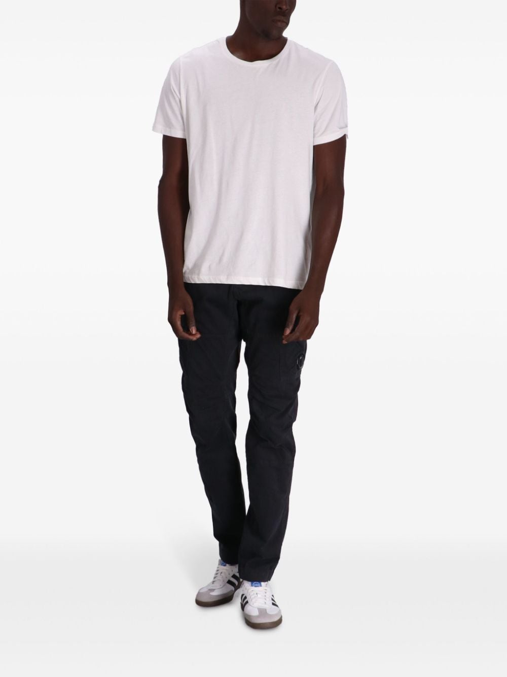 Shop C.p. Company Cargo-pocket Stretch Tapered Trousers In Black