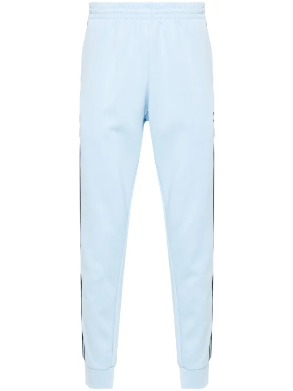 Light blue adidas track pants on sale