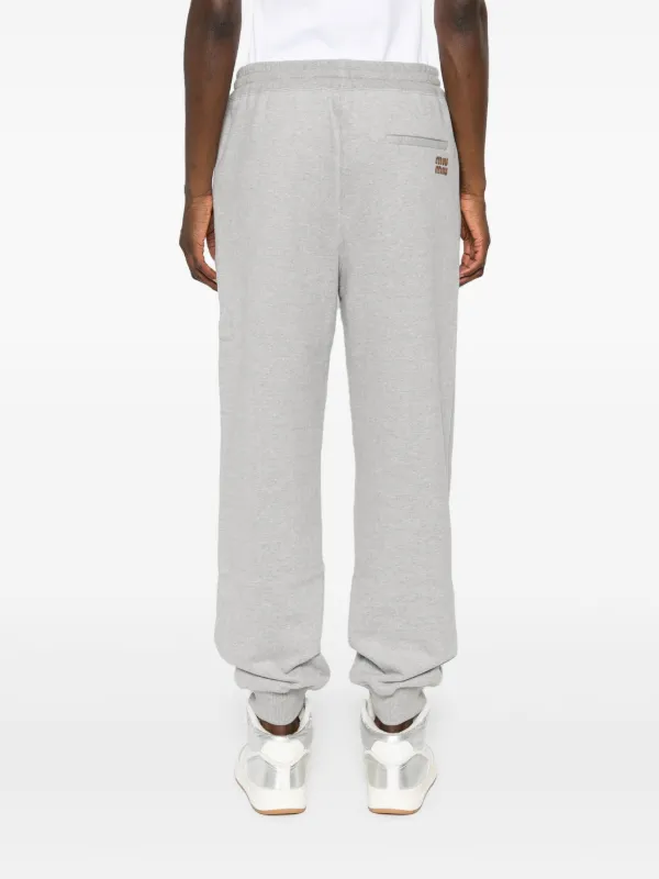 パンツ MIU MIU LOGO PANTS Miu Miu logo-patch Track Pants | Grey | FARFETCH IS