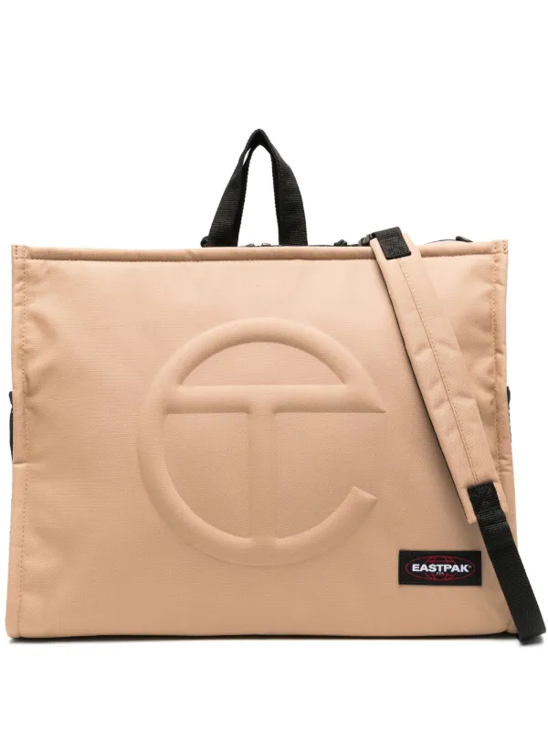 Telfar x Eastpak logo-embossed Backpack | Neutrals | FARFETCH