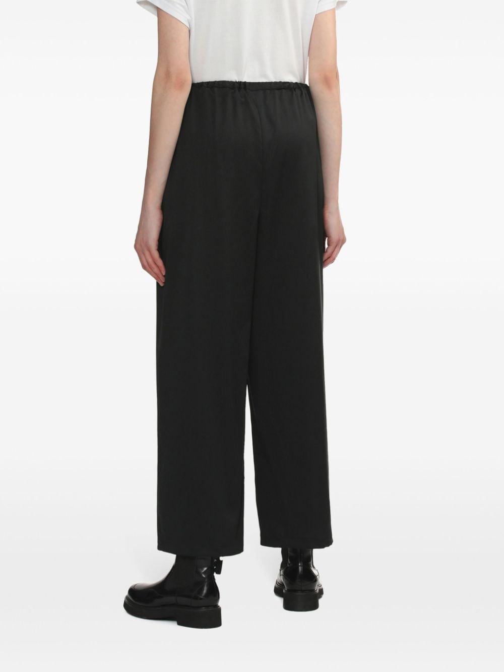 Shop Enföld Graphic-print Wide-leg Trousers In Black