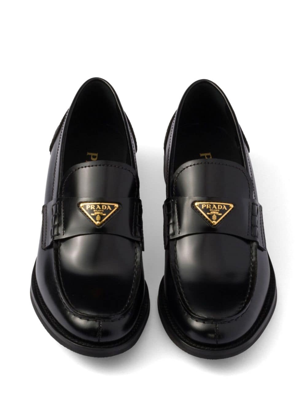 Shop Prada Brushed Leather Loafers In Black