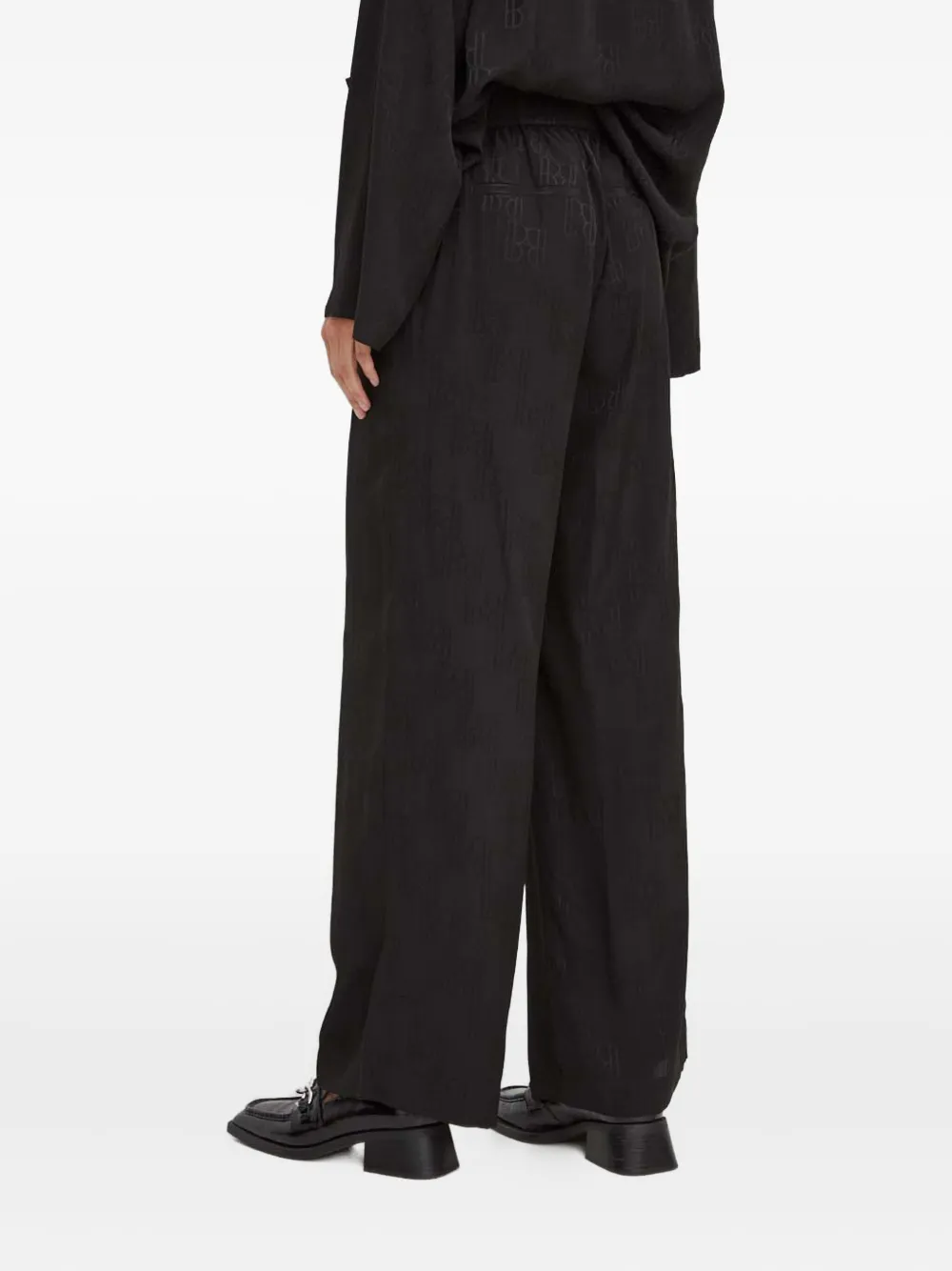 Herskind Monogram-pattern Trousers In Black