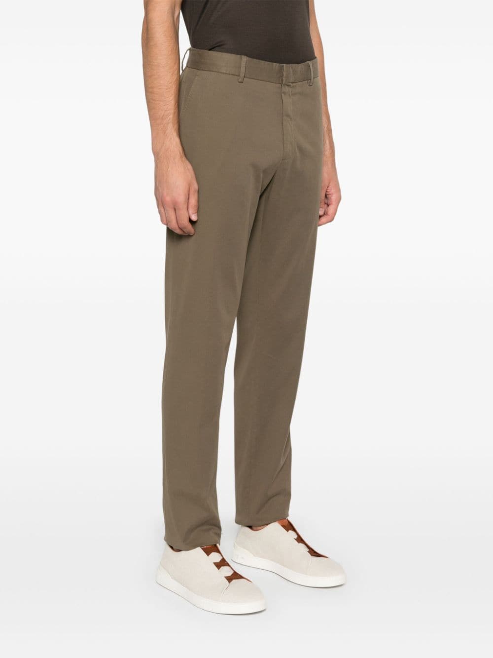 Shop Zegna Tapered Trousers In Green