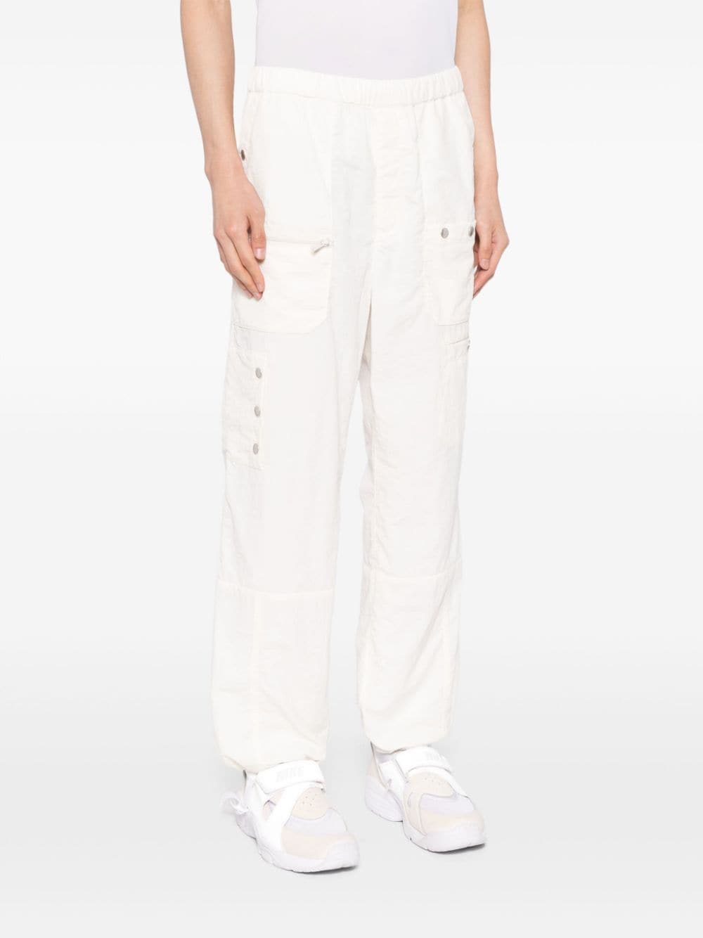 UNDERCOVER X NONNATIVE MULTI-POCKET CARGO TROUSERS 