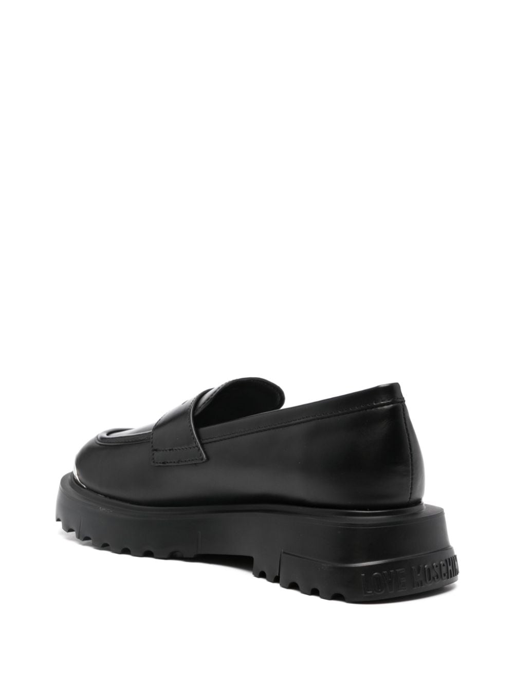 Shop Love Moschino Embossed-logo Loafers In Black