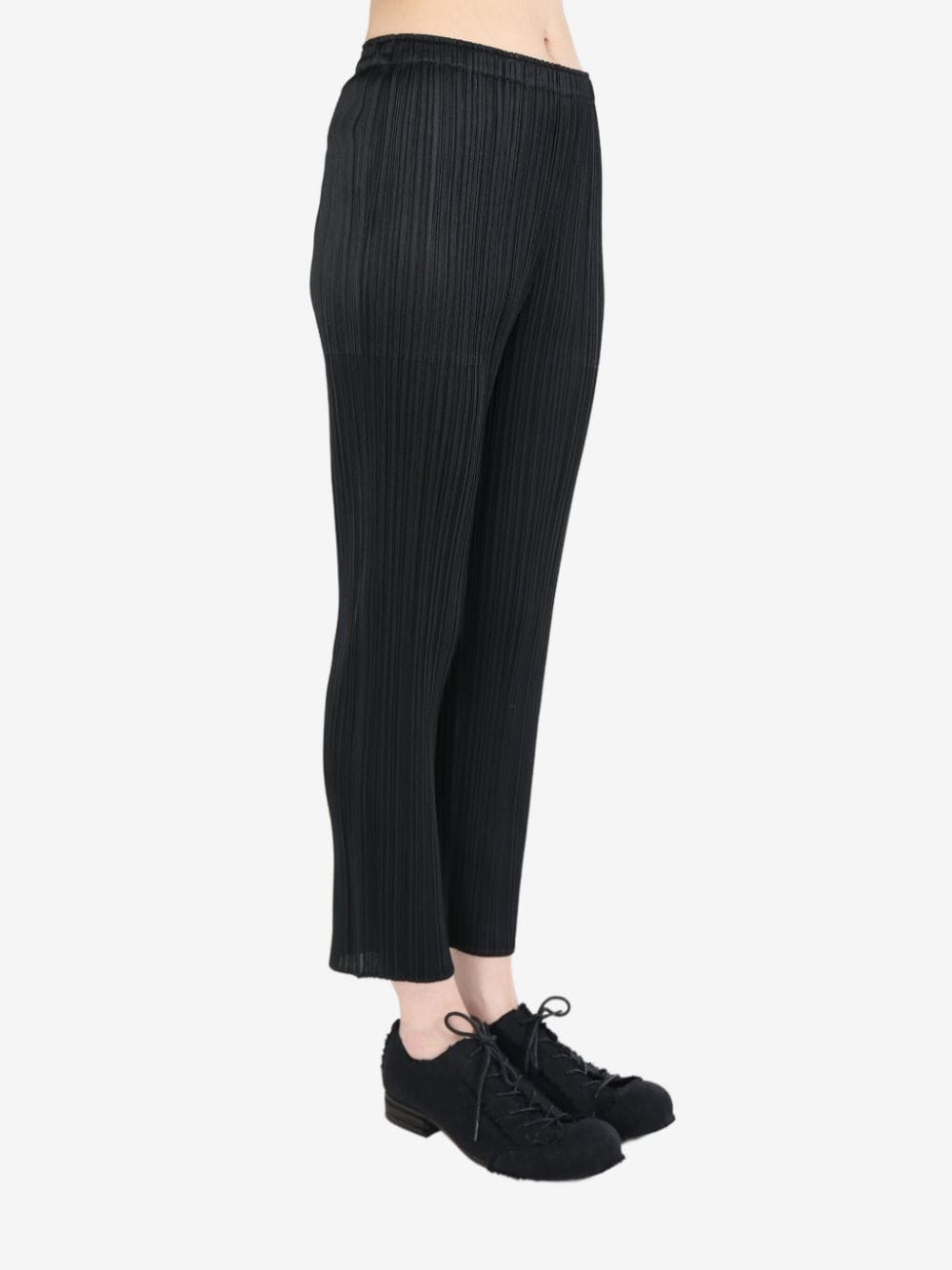 Shop Issey Miyake Pleated Tapered Trousers In Black