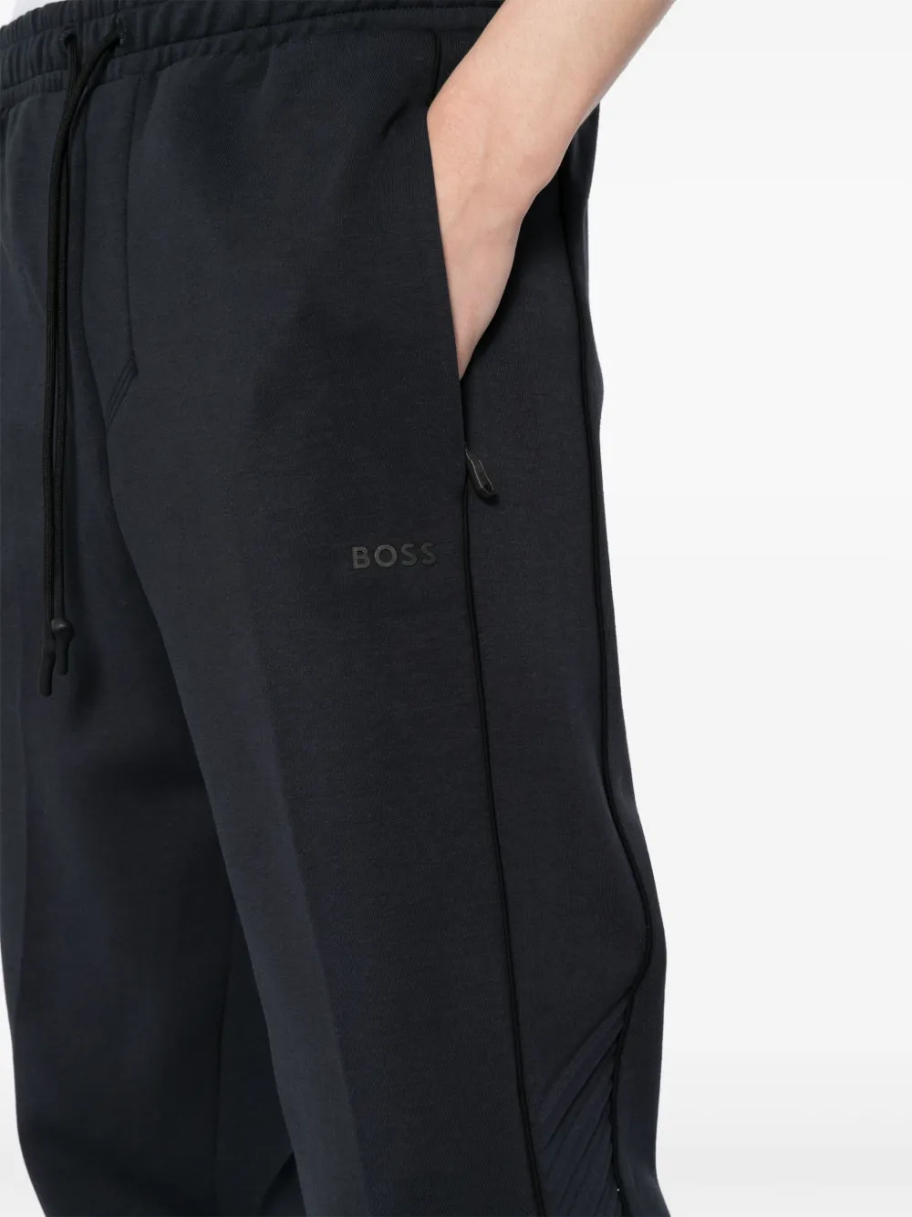 Hugo Boss Artwork-embossed Track Pants In Blue