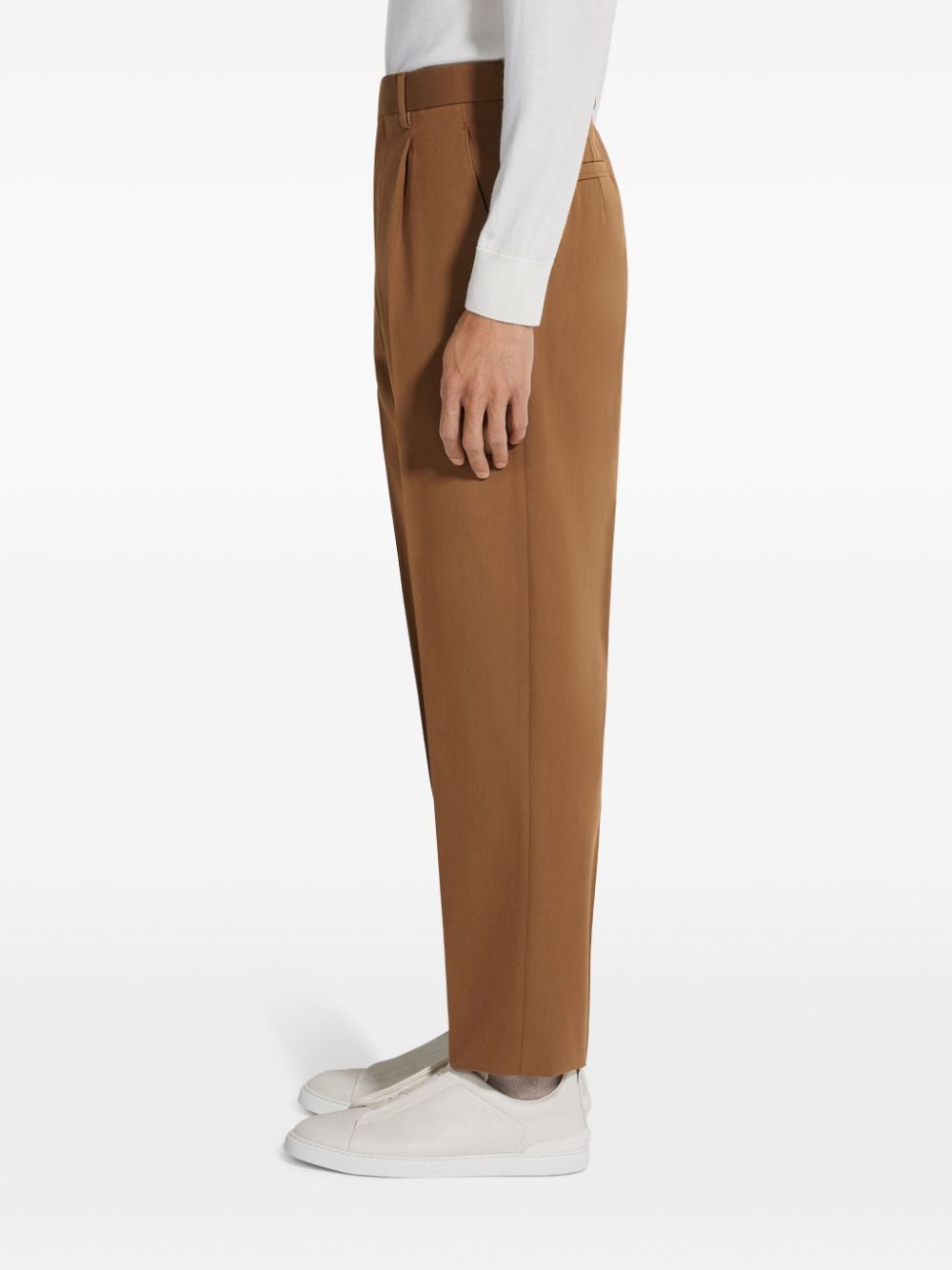 Shop Zegna Tapered Trousers In Brown