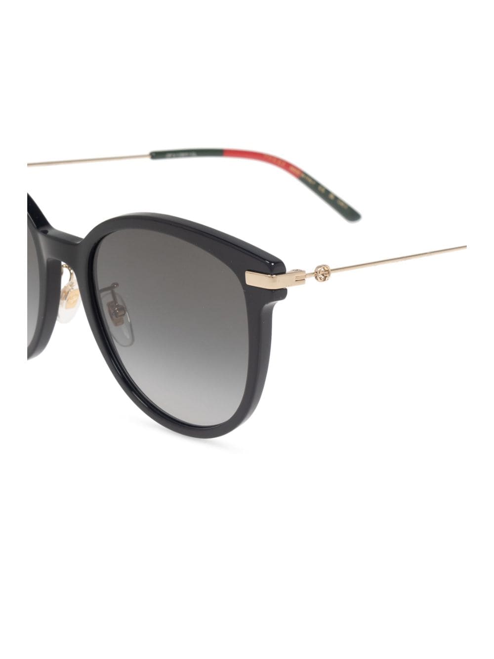 Shop Gucci Cat-eye Frame Sunglasses In Schwarz