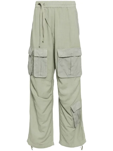 Maharishi pantalones cargo con diseño asimétrico