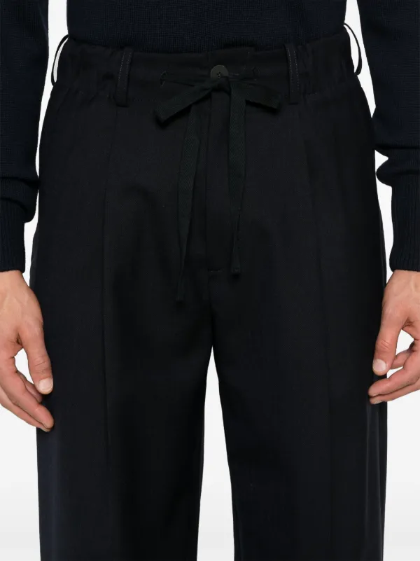 Studio Nicholson Noam Trousers | Blue | FARFETCH