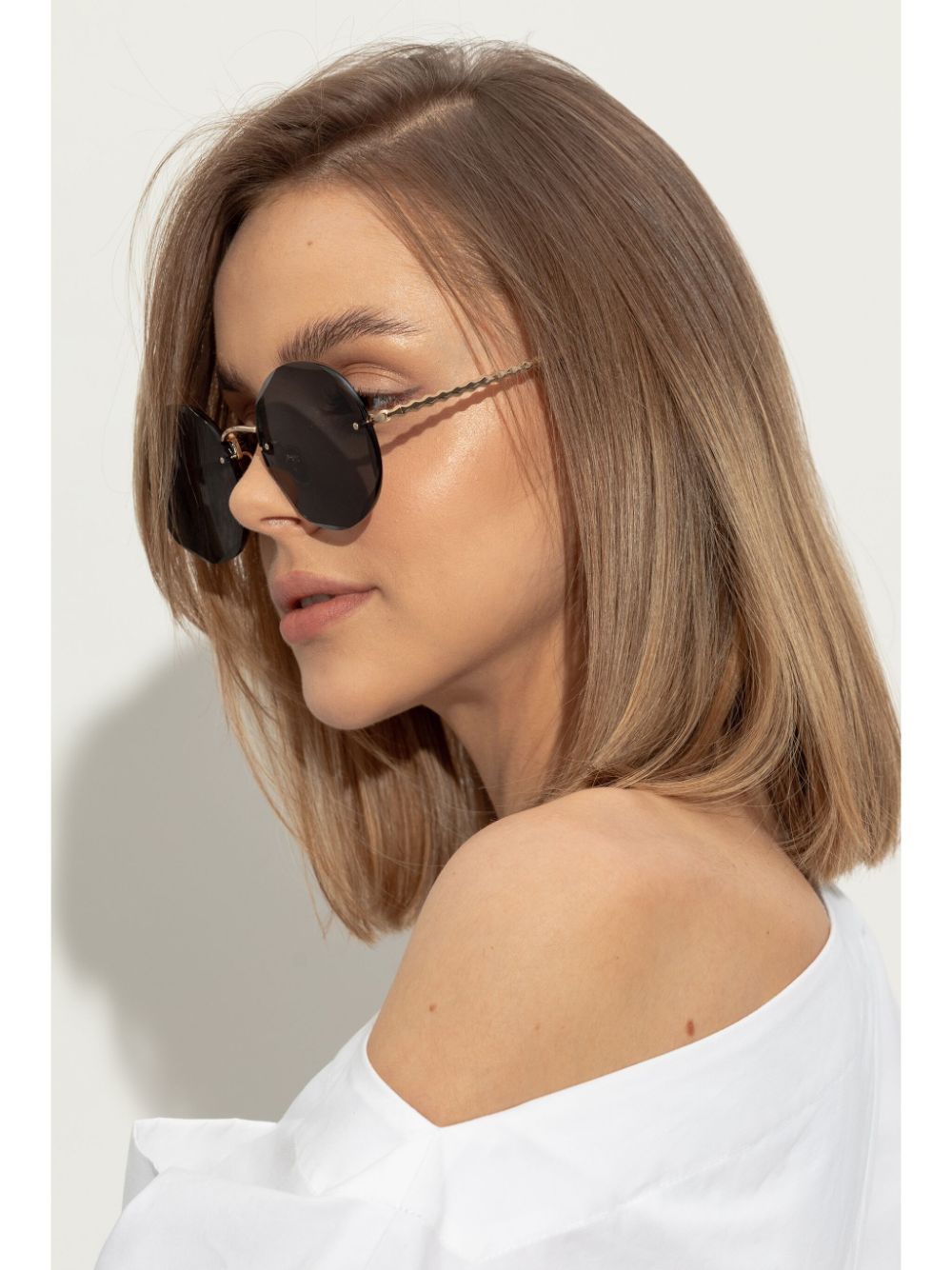 Chloé Eyewear Zonnebril met oversized rond montuur - Goud