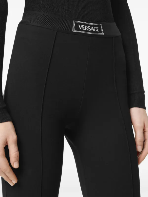国内発送★VERSACE★ロゴ フュゾー '90S レギンス Versace 90s ロゴ レギンス | ブラック | FARFETCH JP