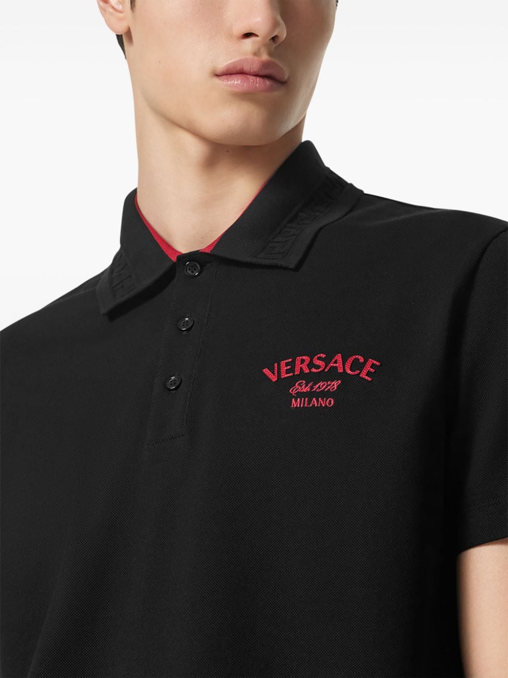 Shop Versace Logo-embroidered Polo Shirt In Black