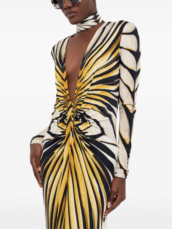 roberto cavalli h&m gold dress Wow. This gold beaded fringe mini dress comes from the 2007 Roberto Cavalli x H&M limited edition collaboration, one of the most iconic drops ever released. Fully embellished and boned in glamour,
