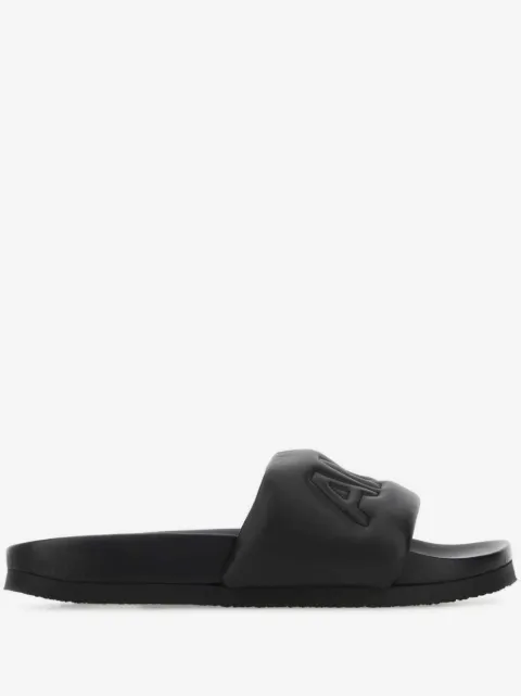 AMBUSH logo-embossed leather slippers 